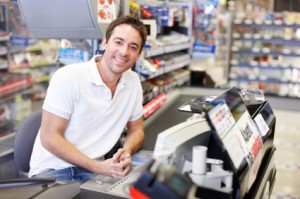 Shop Keeper serving at the till